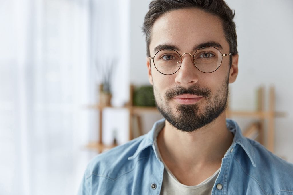 Man wearing round glasses