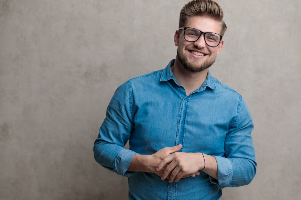 Man wearing square hipster glasses