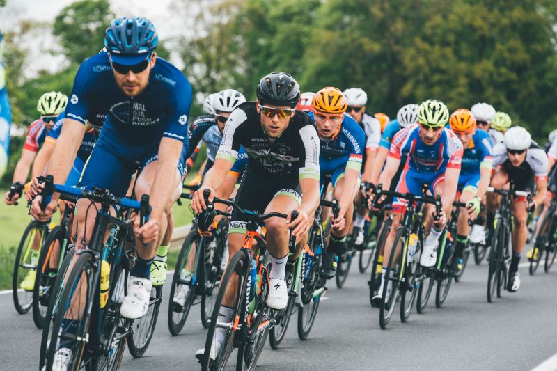 Group of cyclists in cycling glasses