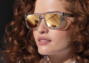 woman wearing mirrored sunglasses