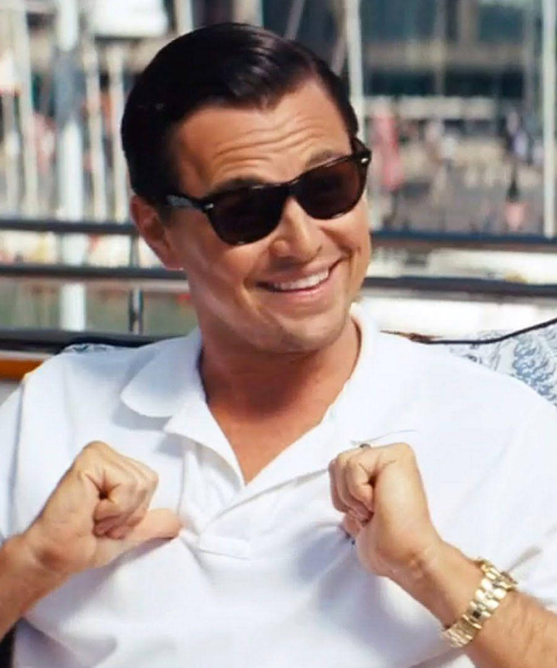 Leonardo DiCaprio wearing Ray-Ban Wayfarer sunglasses in The Wolf of Wall Street
