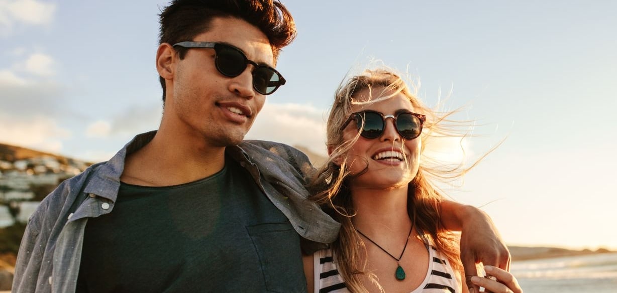 couple wearing clip on sunglasses