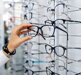 Varifocal Glasses section with guide on choosing the right size frames