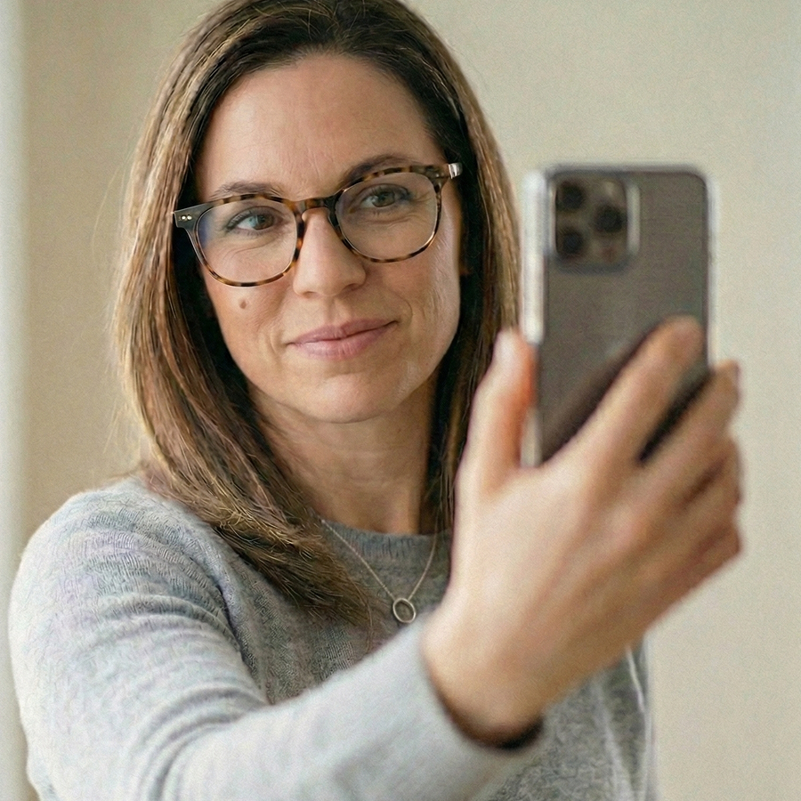 Customer taking a selfie to send to our styling team